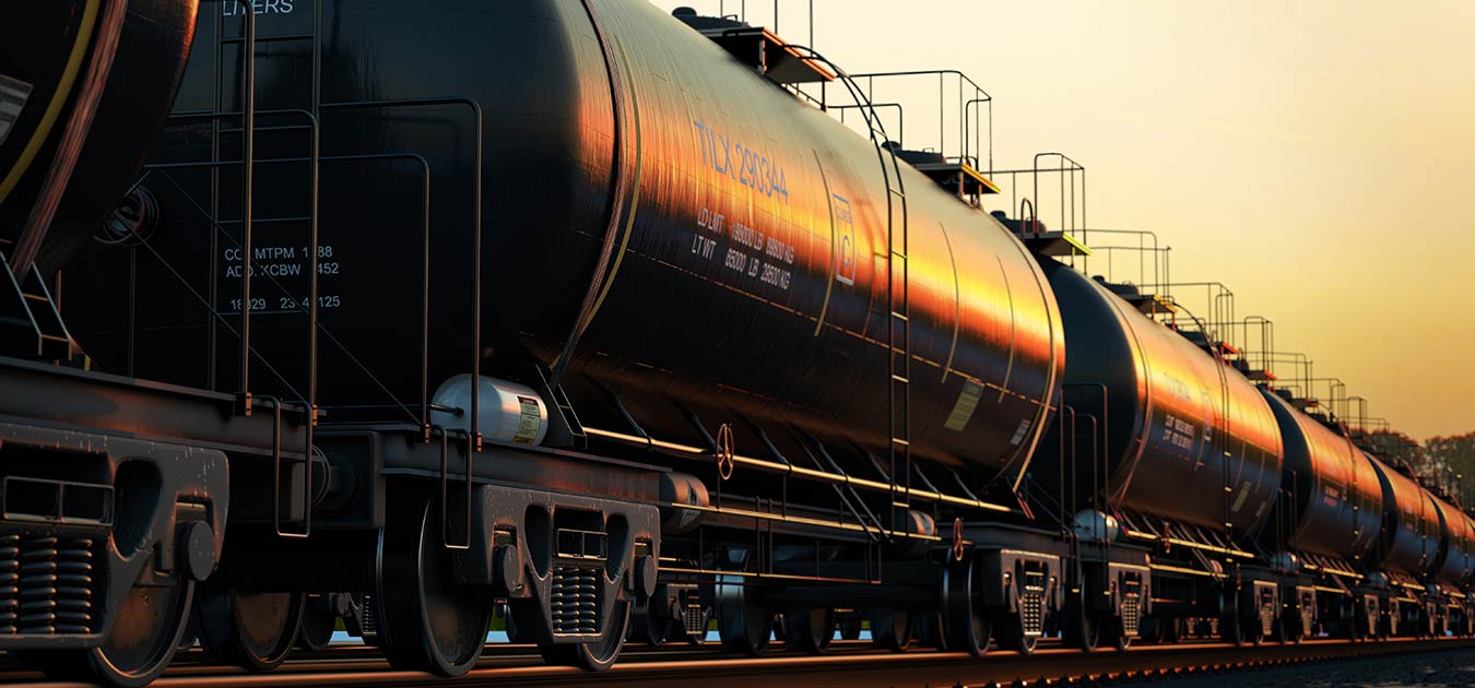 Rail tank cars for petroleum products in the light of the setting sun